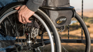 a person sitting on a wheelchair